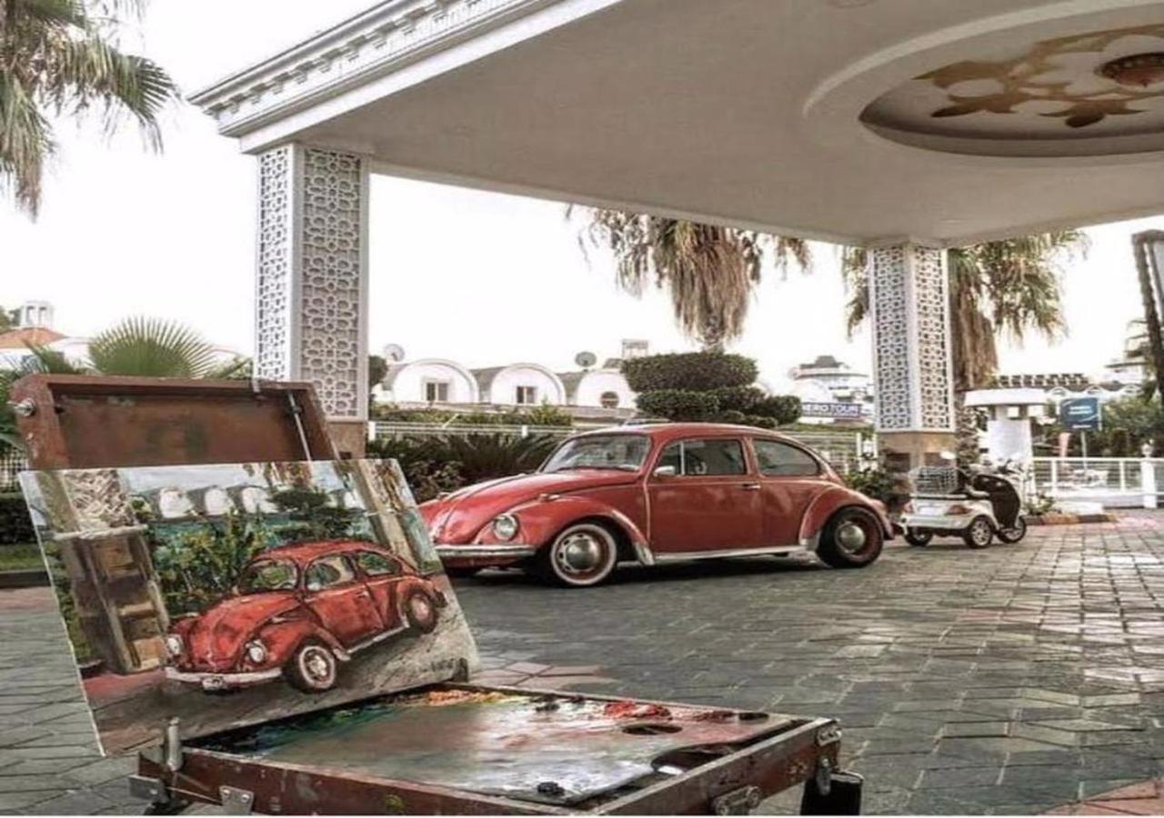 Golden Sunset Hotel&Spa Kemer Exterior photo The Volkswagen Beetle was the first car to be exported from Mexico.